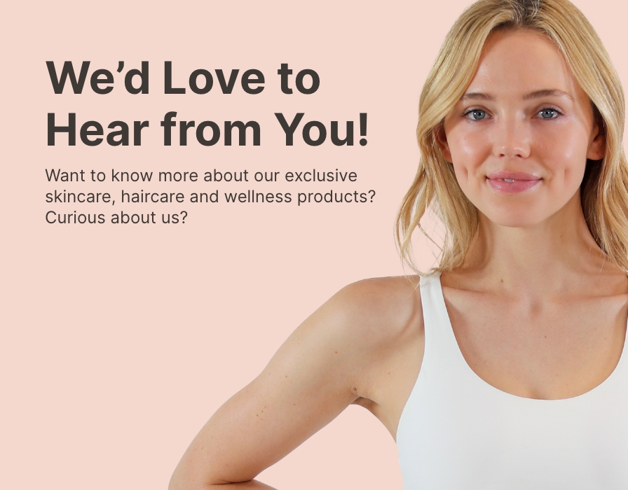 A blonde woman in a white tank top posing next to text that says "We'd Love to Hear from you!"